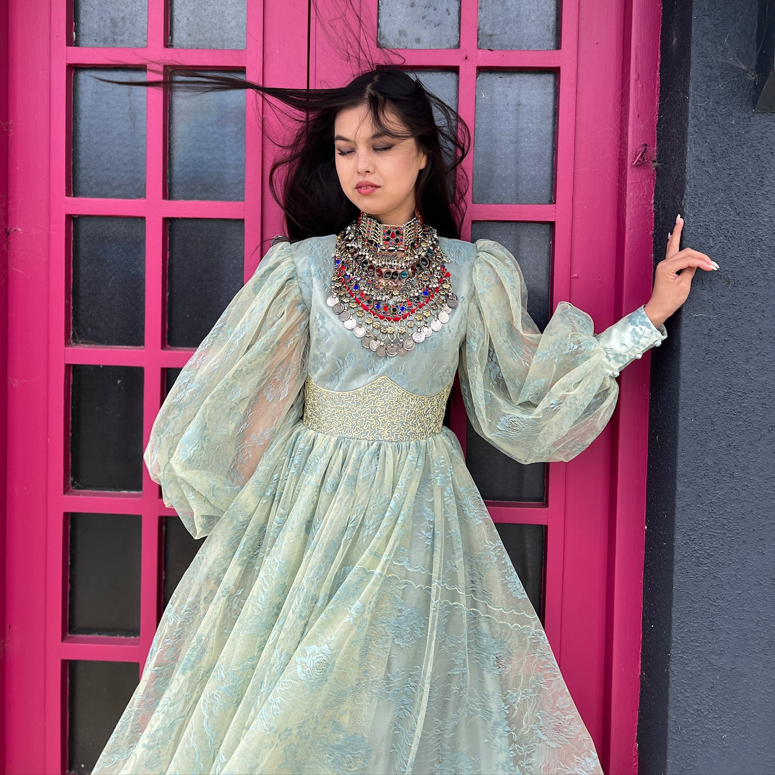 Dreamy pastel green dress, a beautifully embroidered waist, elegant puffed sleeves