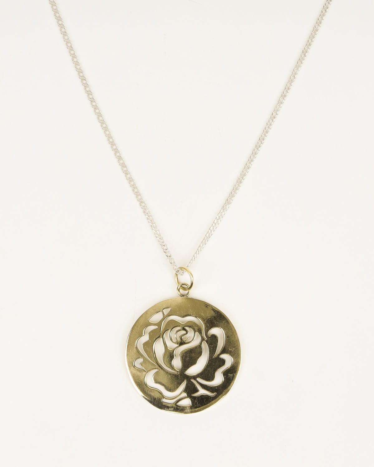 handcrafted circular flower pendant 1