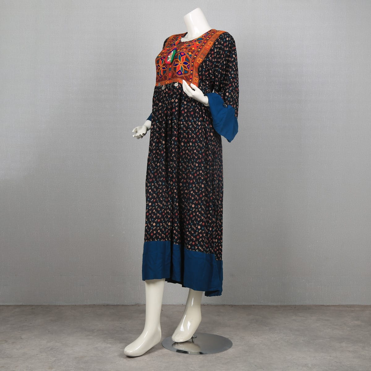 Traditional Afghan Dress with Colorful Embroidery and Floral Print 1