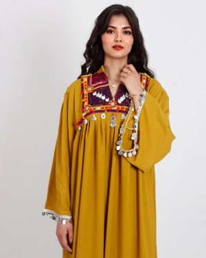 afghanistan women's dress Afghan women hit back at Taliban with #DoNotTouchMyClothes campaign Afghani women in traditional dress