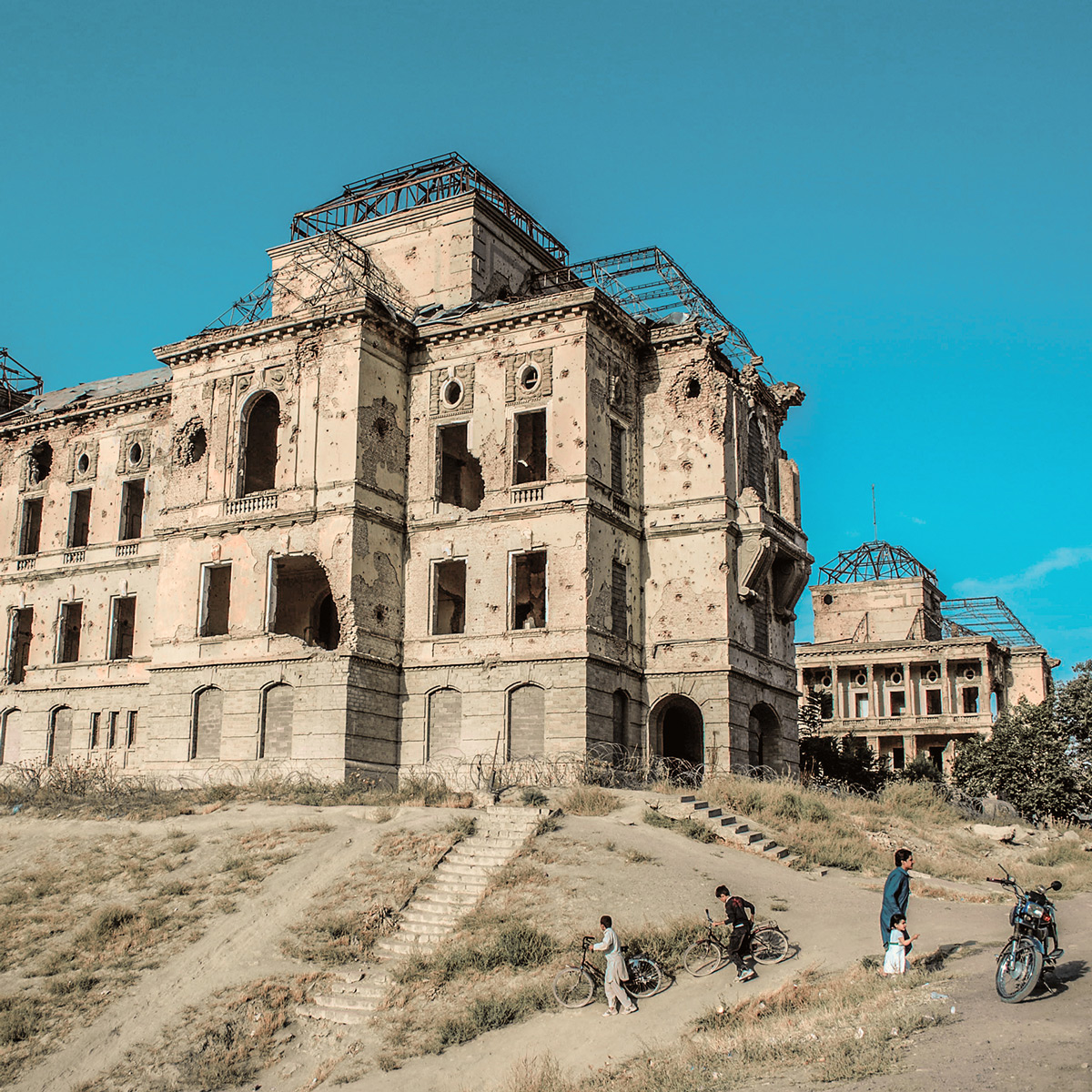 Children Playing Near Darul-aman Castle Photo | Wall-Hanging Landscape Photo
