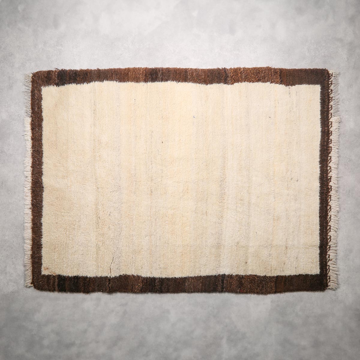 Cream Woolen Nuristani Carpet | Hand-Woven Area Carpet
