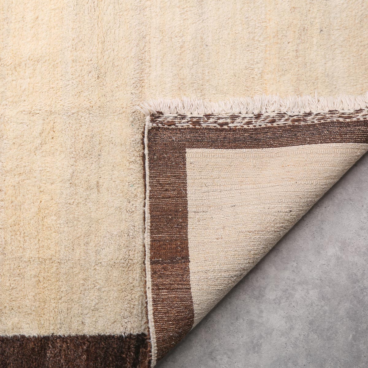 Cream Woolen Nuristani Carpet | Hand-Woven Area Carpet